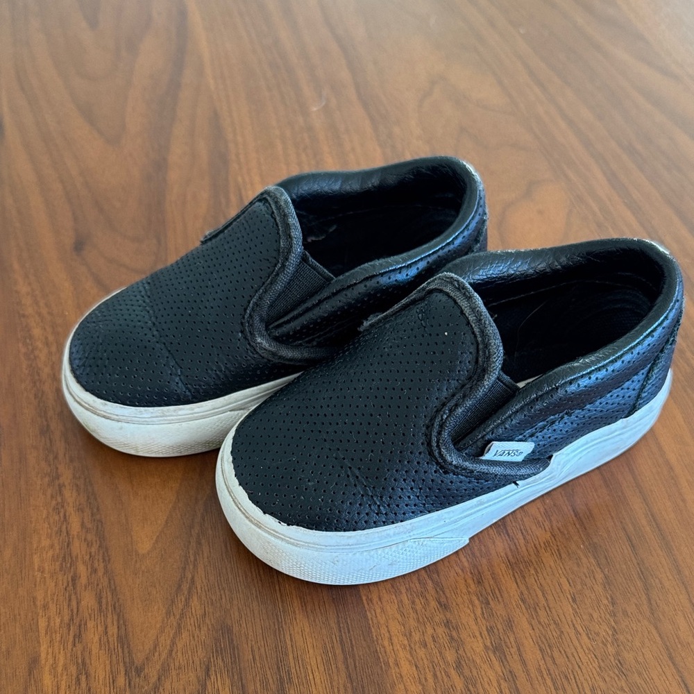 Vans perforated black toddler shoes